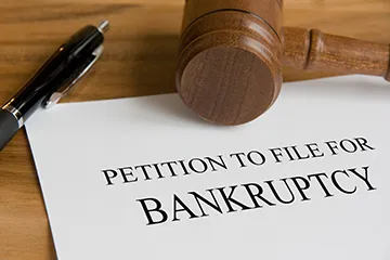 A representation of paperwork to file for bankruptcy.